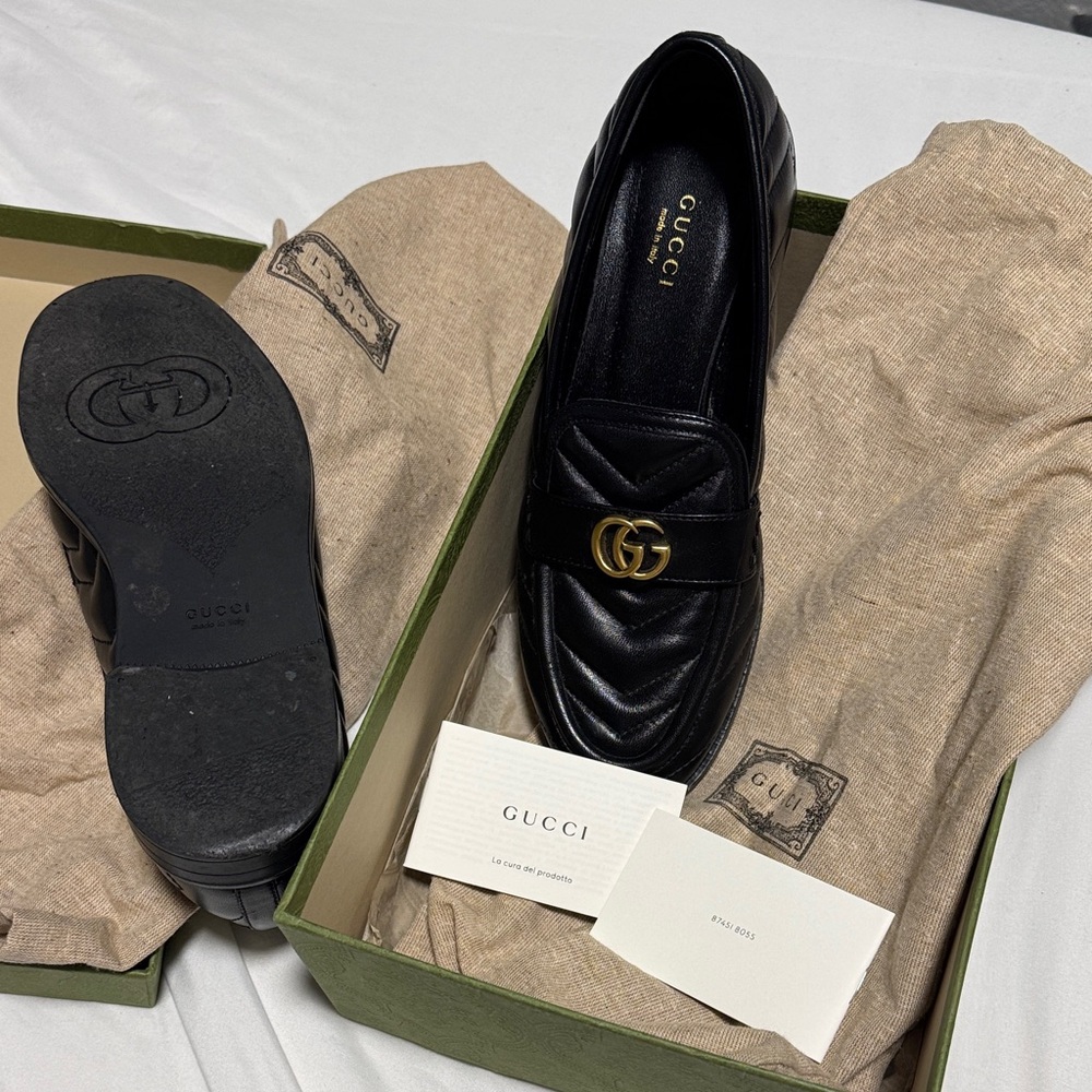 Gucci Black Leather Loafers with Gold Emblem